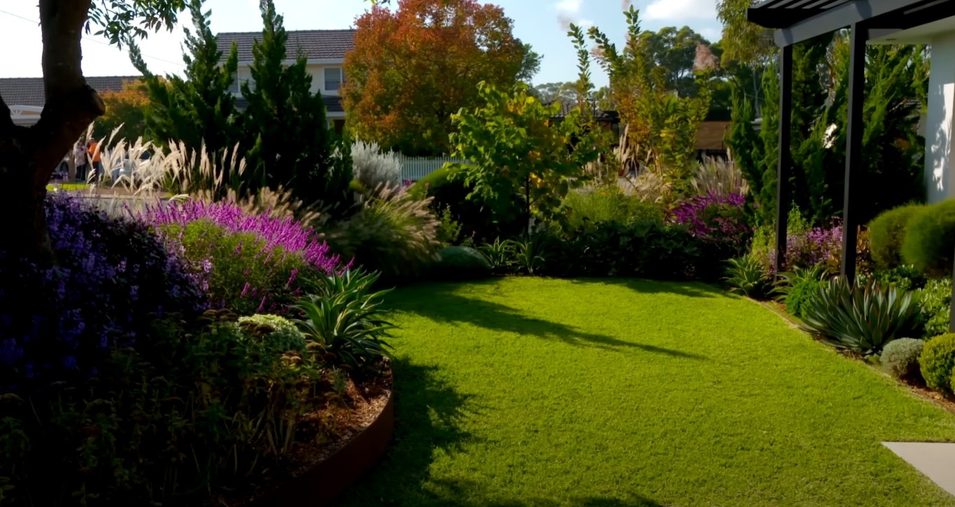 Well-maintained colorful lawn with vibrant flowers and lush greenery in Indio, CA